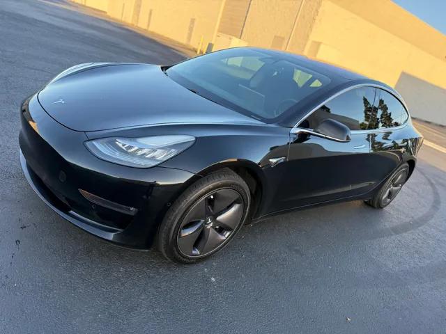 tesla model 3 2018 5YJ3E1EA8JF173340 image tesla model 3 2018 5YJ3E1EA8JF173340 image